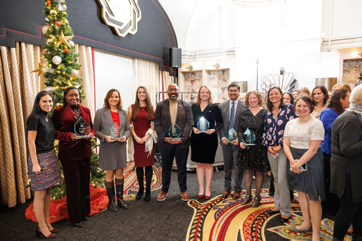 WTS-DC Chapter 2023 Recognition Award Recipients and Recognitions committee members pose at the 2023 WTS-DC Holiday Party.