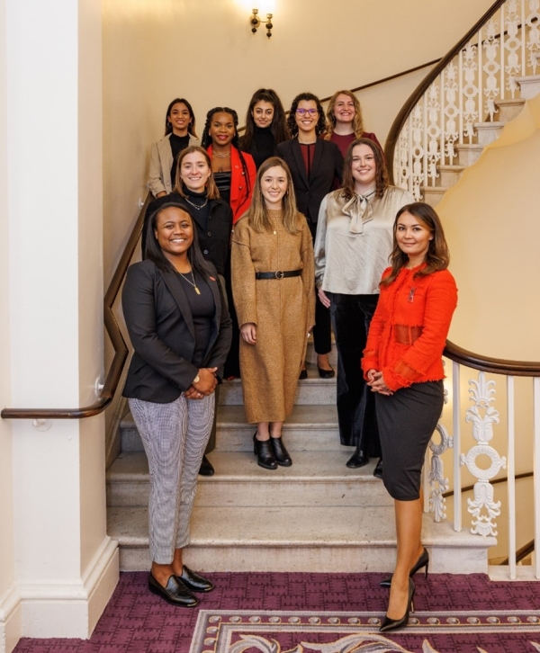 WTS DC Chapter 2023 scholarship recipients and committee members pose on a staircase for a group photo.