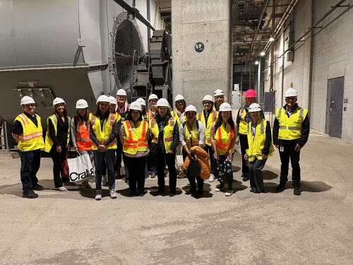 Members of WTS Boston Mentoring Program pose for a group photo on a tour. 
