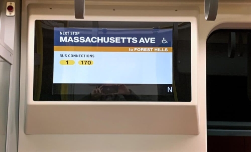 Photo of display board on an Orange line train in Boston. 