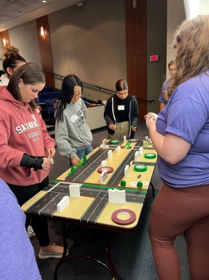 Students working on a roadway design workshop